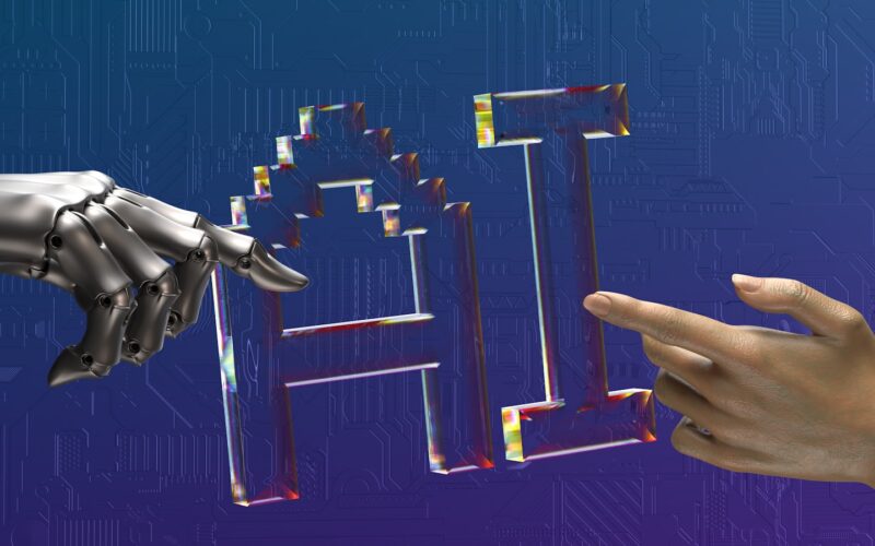 robot and human hands reaching toward ai text
